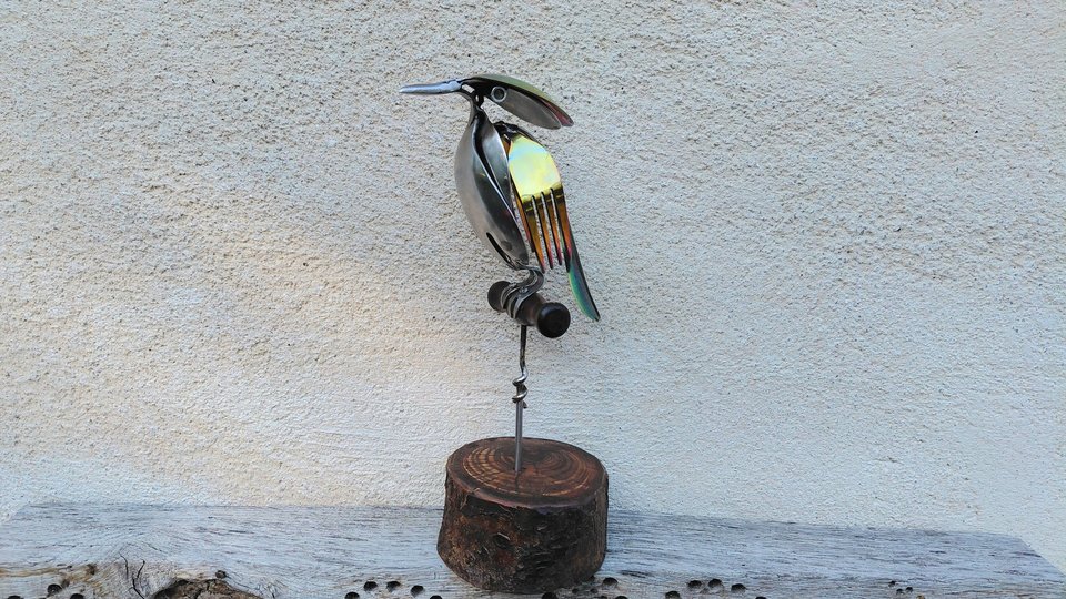 Rainbow Kingfisher on Wooden Stand