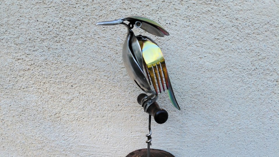 Rainbow Kingfisher on Wooden Stand