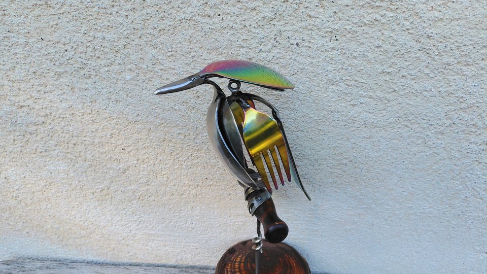 Rainbow Kingfisher on Wooden Stand