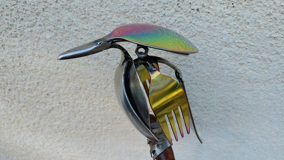 Rainbow Kingfisher on Wooden Stand
