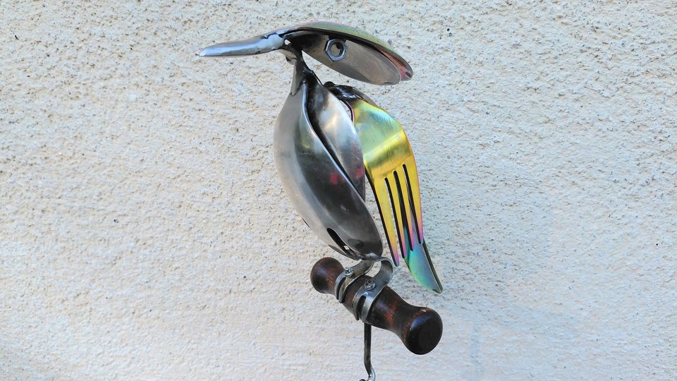 Rainbow Kingfisher on Wooden Stand
